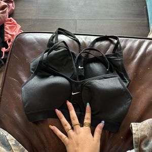 Two Nike Black sports bras- size small